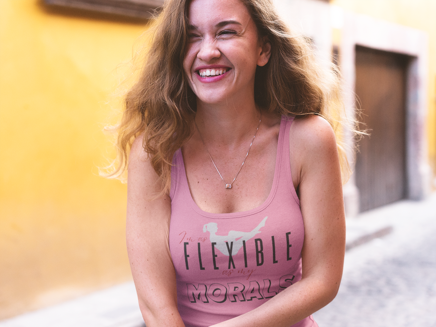 Laughing Female wearing Lane Studio I'm As Flexible As My Morals Graphic Solid Hot Pink Racerback Tank-Top