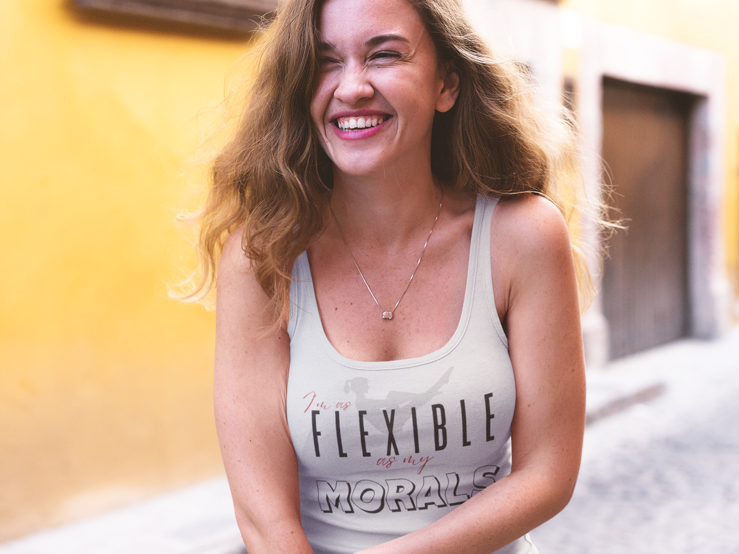 Laughing Female wearing Lane Studio I'm As Flexible As My Morals Graphic Solid White Racerback Tank-Top